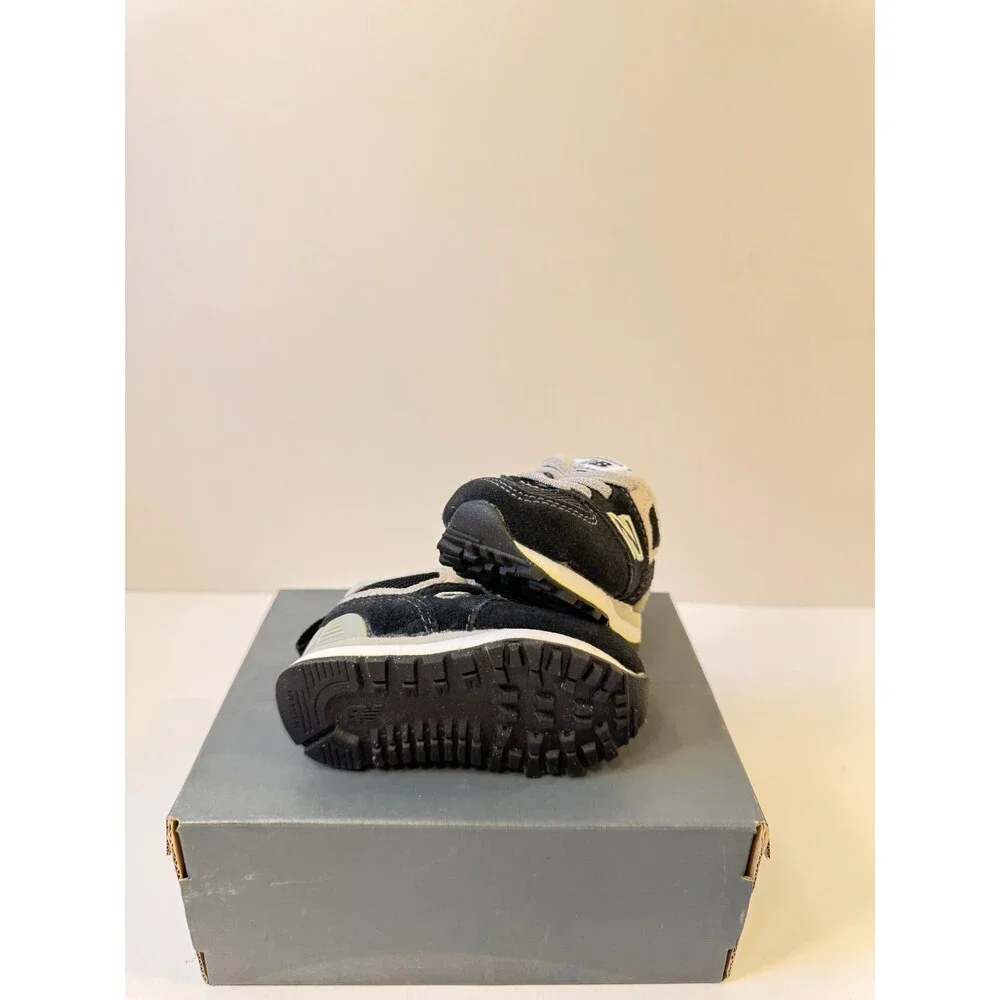 New Balance Kid's 574 Core Bungee Sneaker, Black/White, 2 W Infant (0-12 Months)